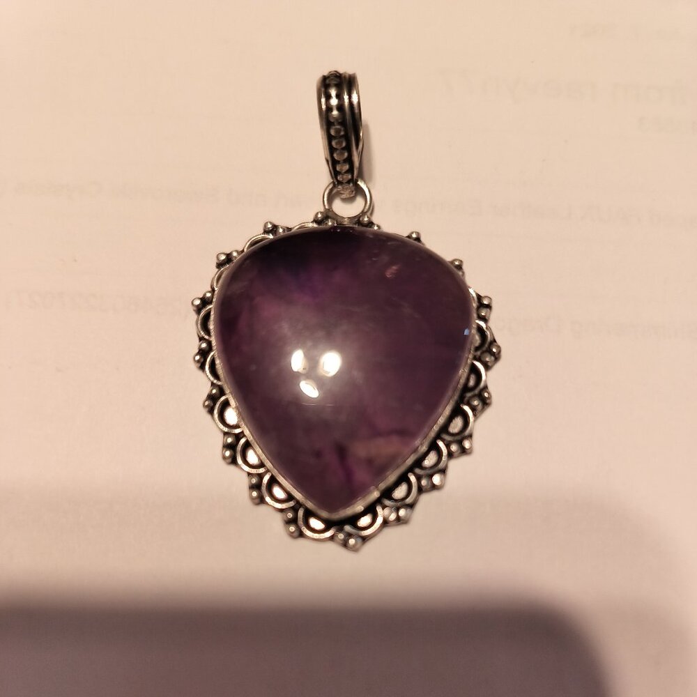 PURPLE AMETHYST PENDANT SET IN SILVER